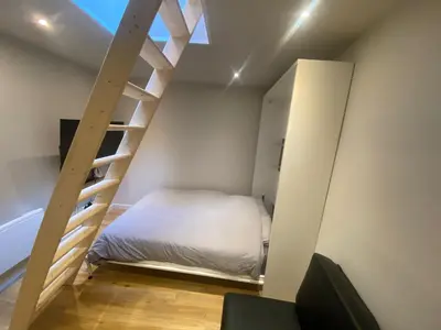 Un ou plusieurs lits dans un hébergement de l'établissement Appartement chic - terrasse en plein ciel - 004