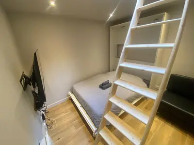 Un ou plusieurs lits dans un hébergement de l'établissement Appartement chic - terrasse en plein ciel - 004