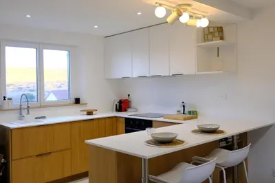 Cuisine ou kitchenette dans l'établissement Les vagues - Sea view house