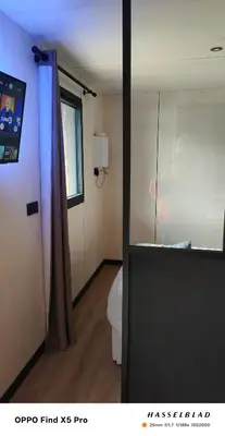 Télévision ou salle de divertissement dans l'établissement Le cocon normand studio de jardin et son écrin de verdure