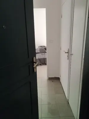Un ou plusieurs lits dans un hébergement de l'établissement Studio centre Rouen rive gauche au pied du T4