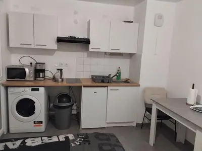 Cuisine ou kitchenette dans l'établissement Studio centre Rouen rive gauche au pied du T4