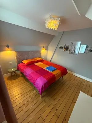 Un ou plusieurs lits dans un hébergement de l'établissement Charme et confort au cœur de Maisons-Laffitte