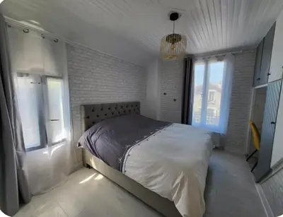 Un ou plusieurs lits dans un hébergement de l'établissement Maison - 4 pers - jardin