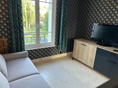 Télévision ou salle de divertissement dans l'établissement Studio - terrasse - 3 ou 4 personnes