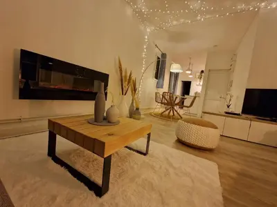 Télévision ou salle de divertissement dans l'établissement Maison Etoiles