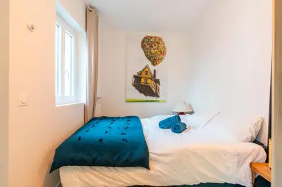 Un ou plusieurs lits dans un hébergement de l'établissement Studio chez Manon élégant studio Cormeilles en Parisis