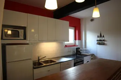 Cuisine ou kitchenette dans l'établissement Gîte Gîtes de France® - La Tanevière