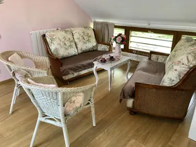 Coin salon dans l'établissement Gîte Gîtes de France® - La Ferme D'Antan
