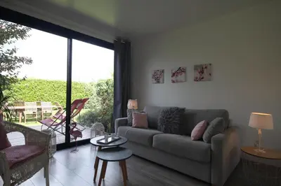 Coin salon dans l'établissement Gîte Gîtes de France® - La Ferme D'Antan