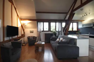 Télévision ou salle de divertissement dans l'établissement Gîte Gîtes de France® - Le Pressoir