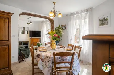 Télévision ou salle de divertissement dans l'établissement Gîte Gîtes de France® - La Lampèrierre