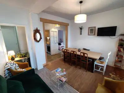 Télévision ou salle de divertissement dans l'établissement Gîte Gîtes de France® - Le Jardin