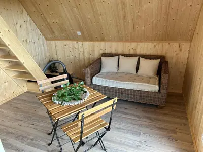 Coin salon dans l'établissement Tiny house