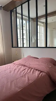 Un ou plusieurs lits dans un hébergement de l'établissement Appartement douillet en centre ville !
