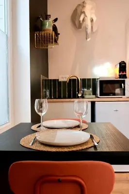 Cuisine ou kitchenette dans l'établissement Nomade City Rouen - Studio Hyper-Centre - 2 personnes