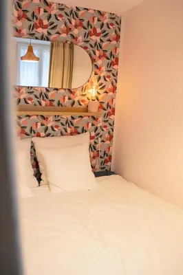 Un ou plusieurs lits dans un hébergement de l'établissement City Rouen - Appartement rénové au cœur de Rouen