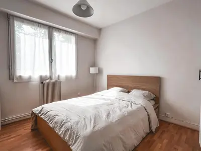 Un ou plusieurs lits dans un hébergement de l'établissement Quiet apartment Place Marine center Maisons Laffitte