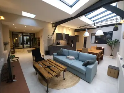 Coin salon dans l'établissement Loft moderne avec garage dans l'hyper centre