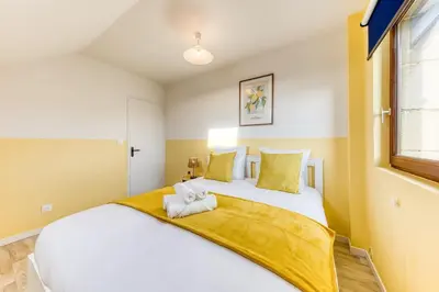 Un ou plusieurs lits dans un hébergement de l'établissement Appartement 6prs - Hyper Centre - Idéal famille et pro