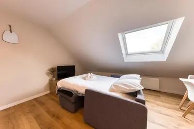 Un ou plusieurs lits dans un hébergement de l'établissement Appartement 6prs - Hyper Centre - Idéal famille et pro