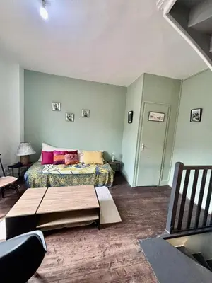 Un ou plusieurs lits dans un hébergement de l'établissement Maison avec terrasse au cœur de Dieppe
