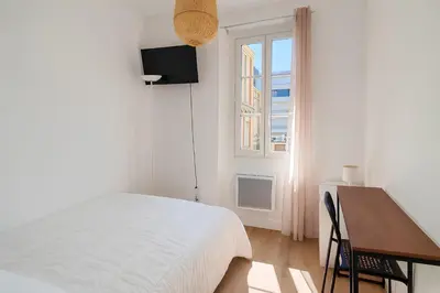 Un ou plusieurs lits dans un hébergement de l'établissement 1 Appart Hôtel Chambre privée, espaces communs partagés, Centre Rouen Gare, Linge & Ménage inclus