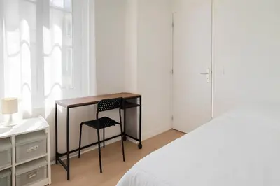 Un ou plusieurs lits dans un hébergement de l'établissement 1 Appart Hôtel Chambre privée, espaces communs partagés, Centre Rouen Gare, Linge & Ménage inclus
