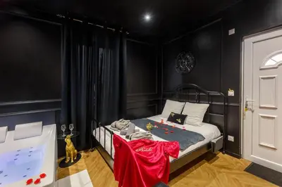 Un ou plusieurs lits dans un hébergement de l'établissement Le Spa Nocturne