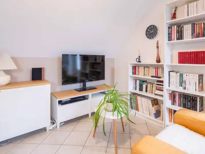 Télévision ou salle de divertissement dans l'établissement Le Grand Chêne