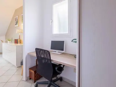 Télévision ou salle de divertissement dans l'établissement Le Grand Chêne
