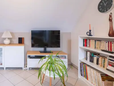 Télévision ou salle de divertissement dans l'établissement Le Grand Chêne
