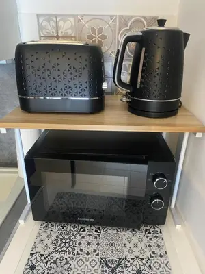 Cuisine ou kitchenette dans l'établissement Aéroport à pied, Escale 25