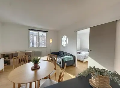 Un ou plusieurs lits dans un hébergement de l'établissement Appartement