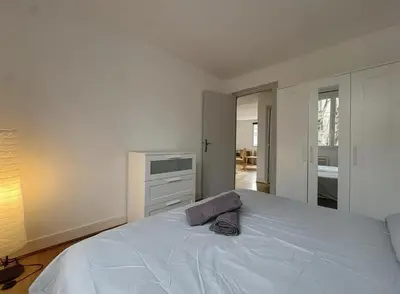 Un ou plusieurs lits dans un hébergement de l'établissement Appartement