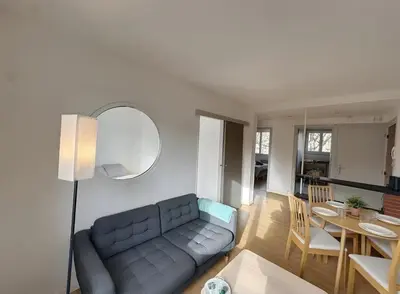 Coin salon dans l'établissement Appartement