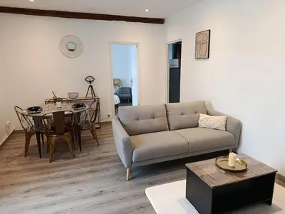 Coin salon dans l'établissement Le Trèfle Doré T2, wifi, private parking space, fêtes interdites