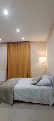 Un ou plusieurs lits dans un hébergement de l'établissement Appartement Mantes la Jolie