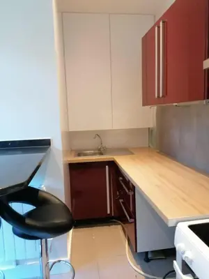 Cuisine ou kitchenette dans l'établissement Appartement Mantes la Jolie