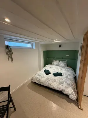 Un ou plusieurs lits dans un hébergement de l'établissement Studio Cosy Place Vieux Marché