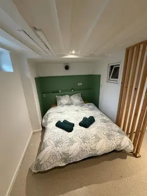 Un ou plusieurs lits dans un hébergement de l'établissement Studio Cosy Place Vieux Marché