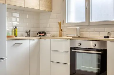 Cuisine ou kitchenette dans l'établissement Louis maison de ville en copro