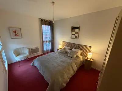 Un ou plusieurs lits dans un hébergement de l'établissement APPARTEMENT F3 BUCHELAY Calme parking privé proche de la gare