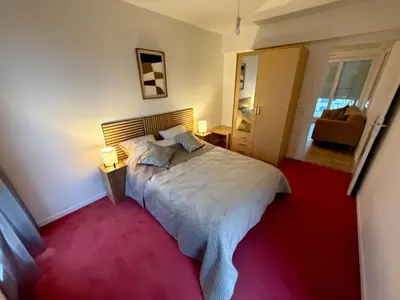 Un ou plusieurs lits dans un hébergement de l'établissement APPARTEMENT F3 BUCHELAY Calme parking privé proche de la gare