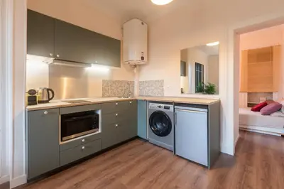 Cuisine ou kitchenette dans l'établissement Cozy Rouen