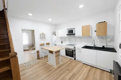 Cuisine ou kitchenette dans l'établissement Maison Connectée Serenia