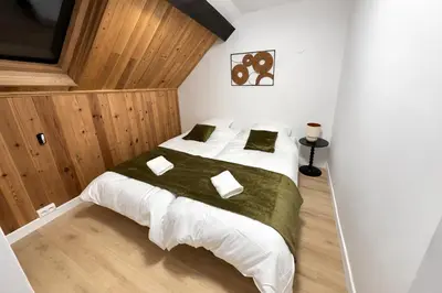 Un ou plusieurs lits dans un hébergement de l'établissement Maison Connectée Serenia
