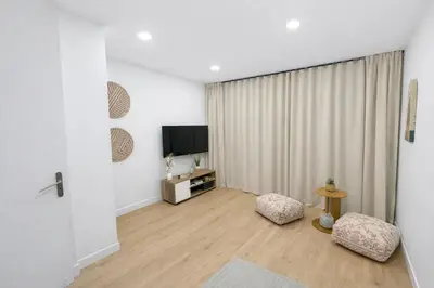 Télévision ou salle de divertissement dans l'établissement Maison Connectée Serenia