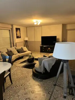 Télévision ou salle de divertissement dans l'établissement Gîte familiale au cœur d un centre équestre