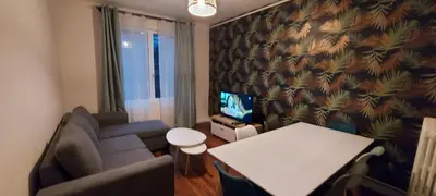 Télévision ou salle de divertissement dans l'établissement Dieppe Appartement Vue plage et port